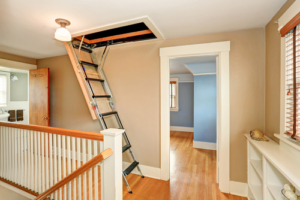 Attic stairs lowered for access.